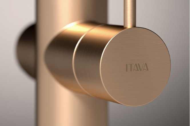 Minimalist brushed gold single-lever faucet on a modern kitchen counter