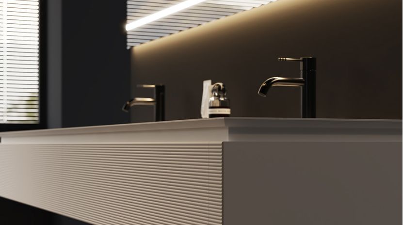A close-up of a white solid wood bathroom vanity with an integrated double-basin sink