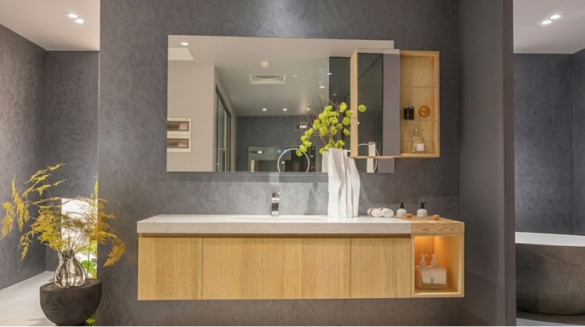 recessed solid wood mirror cabinet in a modern bathroom